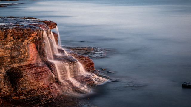 Waterfall cliff ocean dusk longexposure free wallpaper - medium preview image