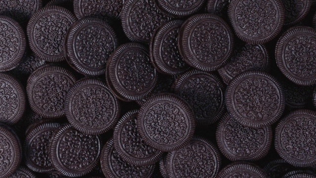 Chocolate cookies pile opart photorealistic free wallpaper - medium preview image