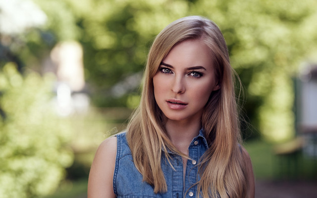 Blonde woman serious portrait bokeh free wallpaper - medium preview image