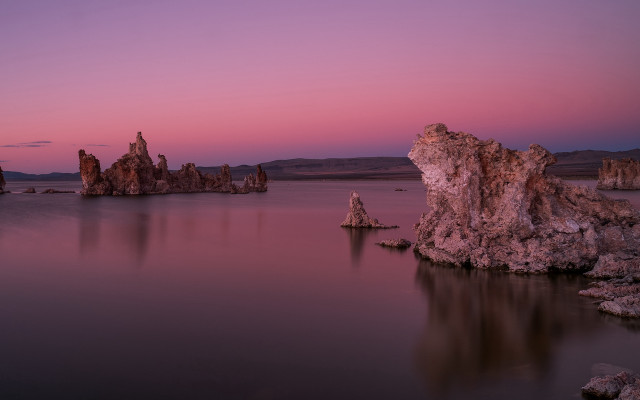 Purple sky rocks water mountains free wallpaper - medium preview image