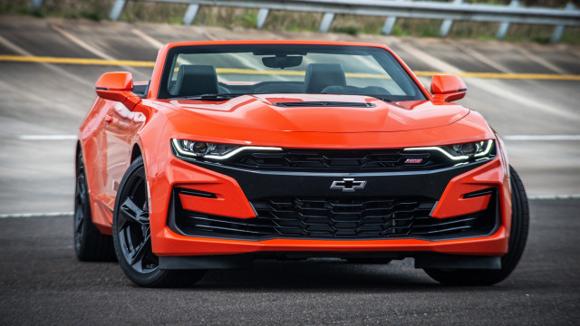 Bright orange sports car black free wallpaper - medium preview image