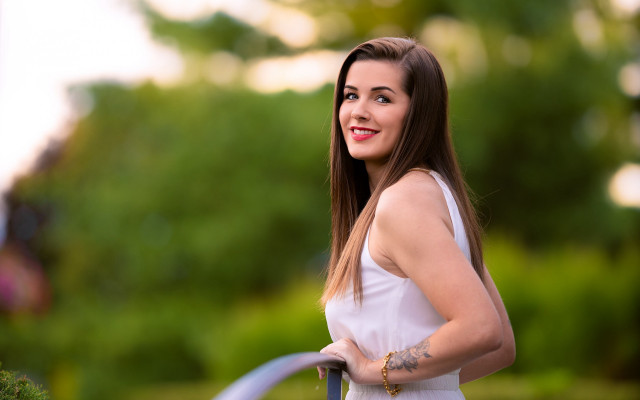 Smiling woman white dress blue free wallpaper - medium preview image