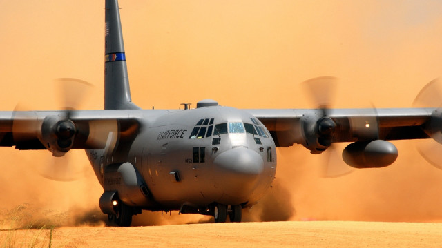 Large airplane dusty dirt field free wallpaper - medium preview image