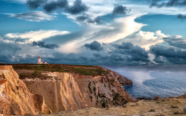 Lighthouse cliff ocean cloudy sky #2 free wallpaper - medium preview image