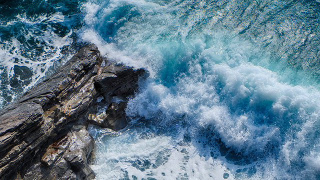 Rock outcropping wave ocean cliff free wallpaper - medium preview image