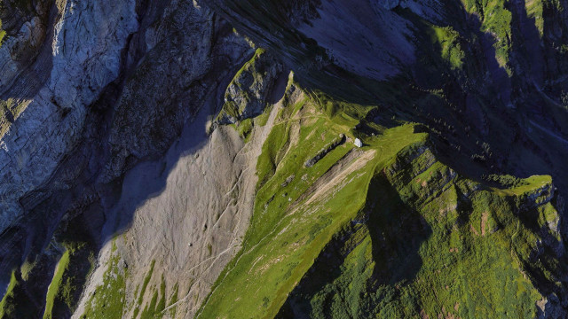 Mountain grassy slope white building free wallpaper - medium preview image