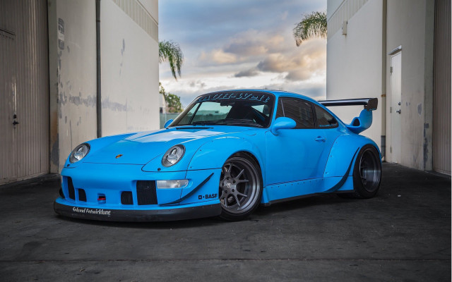 Blue sports car garage palm free wallpaper - medium preview image