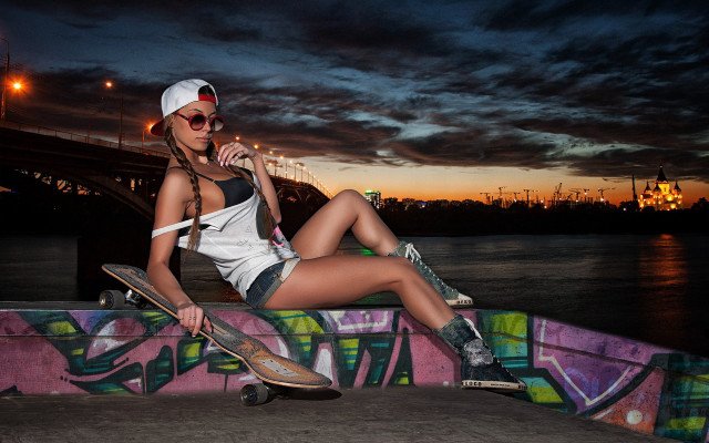 Woman sitting skateboard beach fashion free wallpaper - medium preview image
