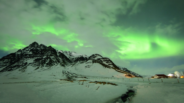 Green white aurora mountain scene free wallpaper - medium preview image