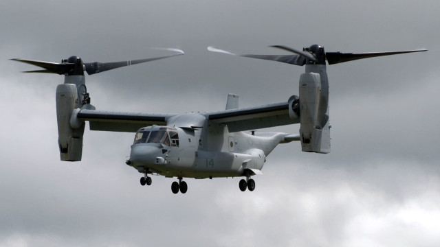 Large propeller plane flying cloudy #3 free wallpaper - medium preview image