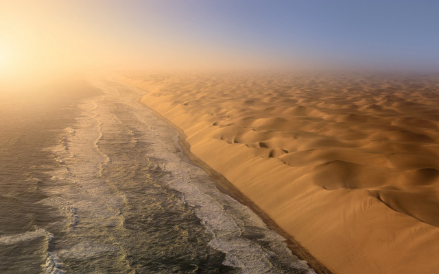 Sandy beach water sunset desert free wallpaper - medium preview image
