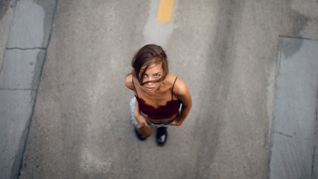 Woman surprised street blackshoes tiltshift free wallpaper - medium preview image