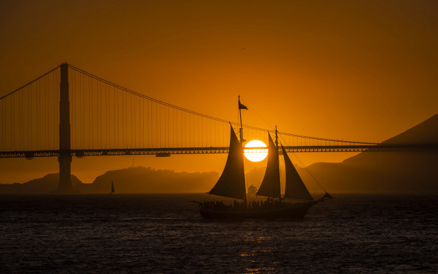 Sailboat ocean sunset bridge horizon free wallpaper for desktop - medium preview image