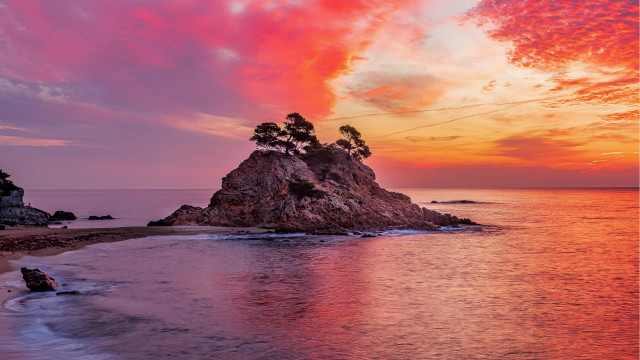 Sunset beach rock formation mystical free wallpaper - medium preview image