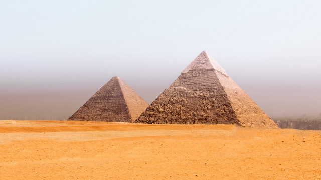 Three pyramids desert hazy sky free wallpaper - medium preview image