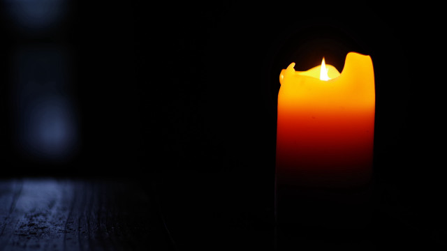 Lit candle dark background gothic free wallpaper - medium preview image