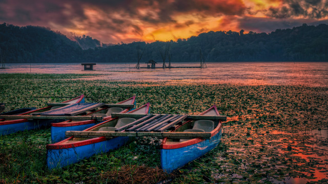 Boats grass lake cloudy sunset free wallpaper - medium preview image