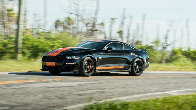 Black sports car driving forest #3 free wallpaper - medium preview image