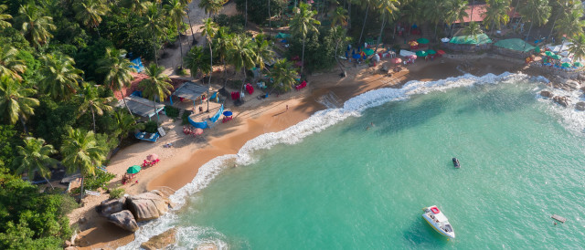 Beach boat people trees water free wallpaper - medium preview image