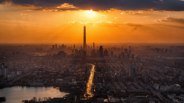 City skyline tower sunset clouds free wallpaper for desktop - medium preview image