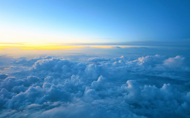 Sky clouds sun mountains ocean free wallpaper - medium preview image