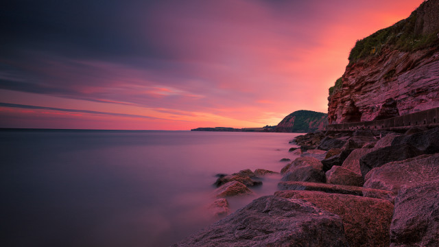 Sunset ocean rocks cliff landscape free wallpaper - medium preview image