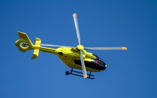 Yellow helicopter blue sky propellers free wallpaper - medium preview image