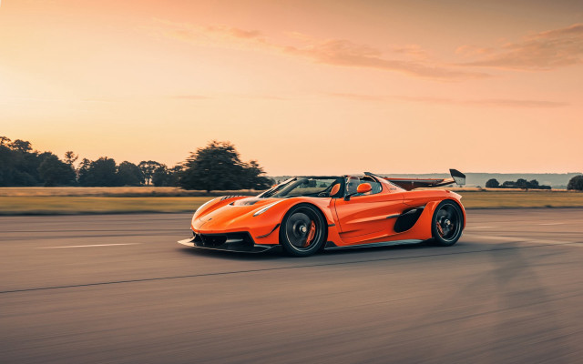 Orange sports car sunset road free wallpaper - medium preview image