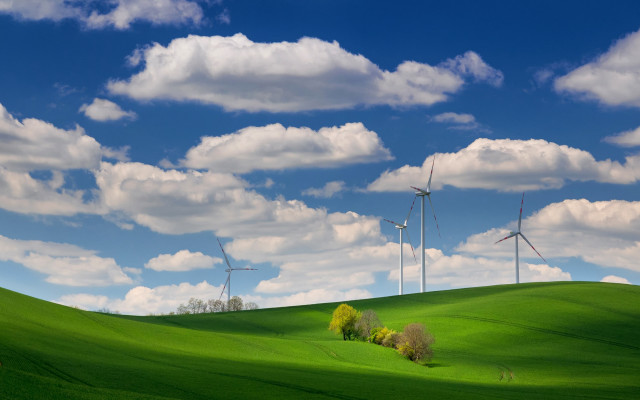 Green field wind turbines clouds free wallpaper - medium preview image