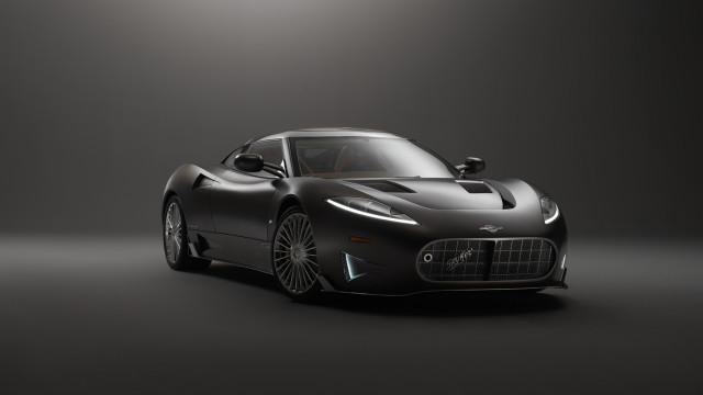 Black sports car studio photo free wallpaper - medium preview image