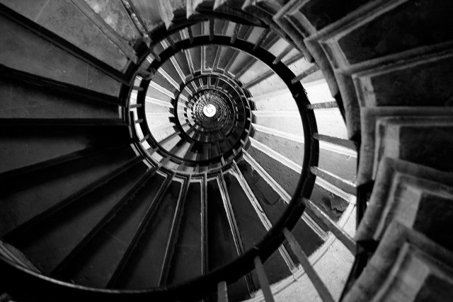 Spiral staircase skylight person standing free wallpaper - medium preview image