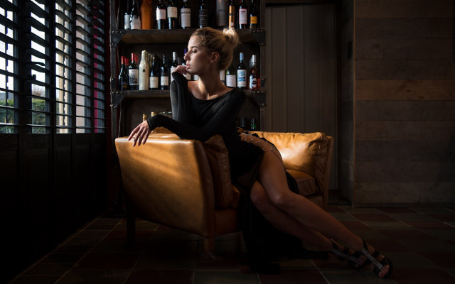 Woman sitting wine bottle fashion free wallpaper - medium preview image