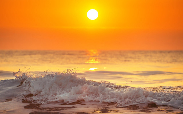 Sunset ocean wave orange sky free wallpaper - medium preview image