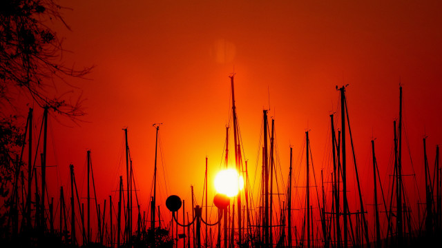 Sunset tall poles orange sky free wallpaper - medium preview image