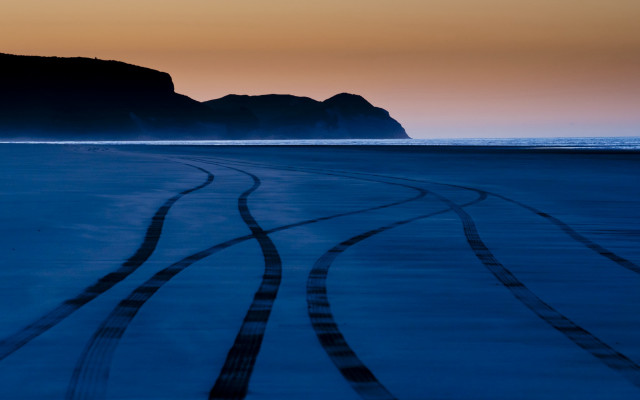 Snow tracks mountain sunset land free wallpaper for desktop - medium preview image