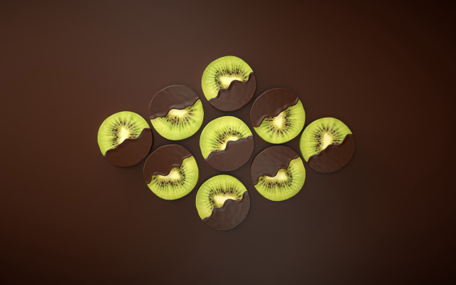 Kiwi slices brown surface dark free wallpaper - medium preview image