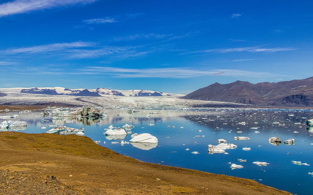Iceberg mountains water bird sunset free wallpaper - medium preview image