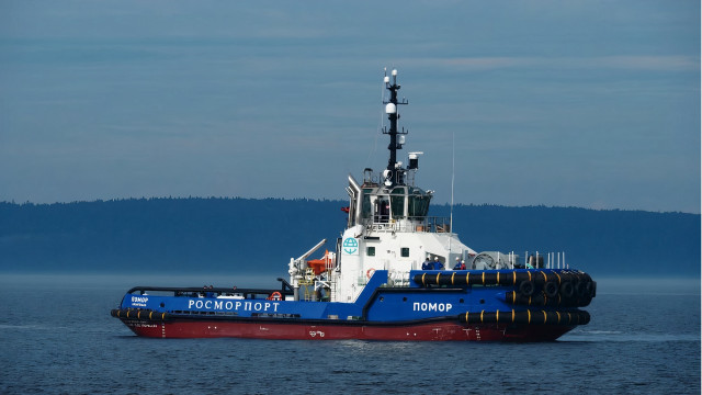 Tugboat mountain water ocean sun free wallpaper - medium preview image