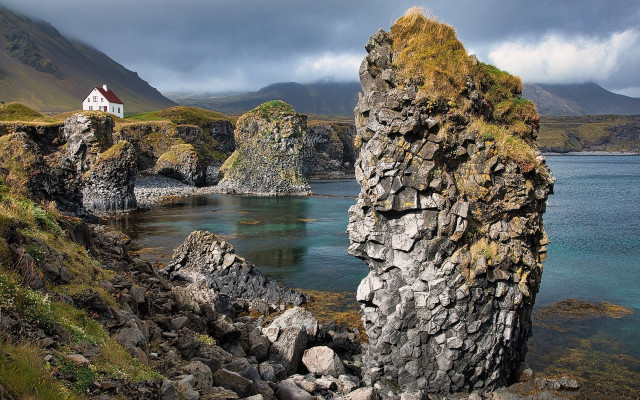 Cliff house overlook water mountains free wallpaper - medium preview image