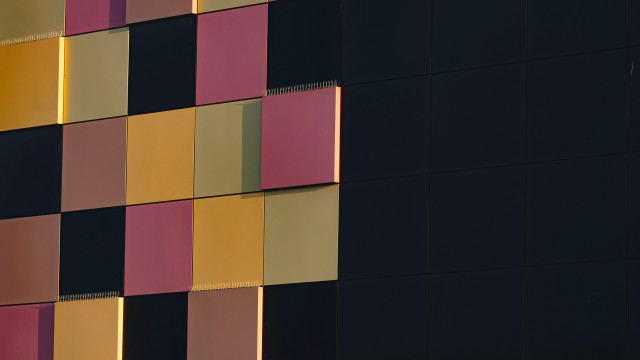 Multicolored facade clock building modular free wallpaper - medium preview image