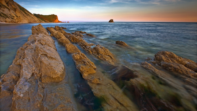 Rocky beach rocks outcropping sky free wallpaper - medium preview image