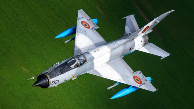 Fighter jet green field aerial free wallpaper - medium preview image