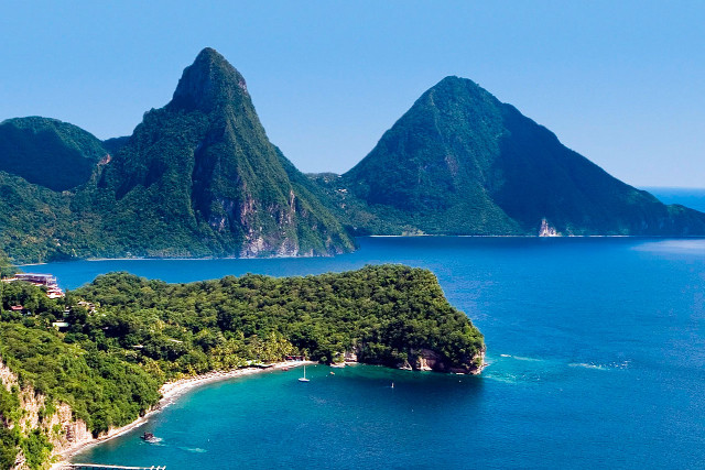 Small island mountains water boat free wallpaper - medium preview image