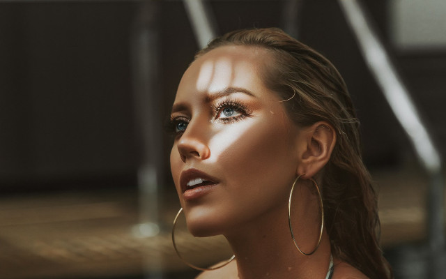 Woman earrings white dress blurry free wallpaper - medium preview image