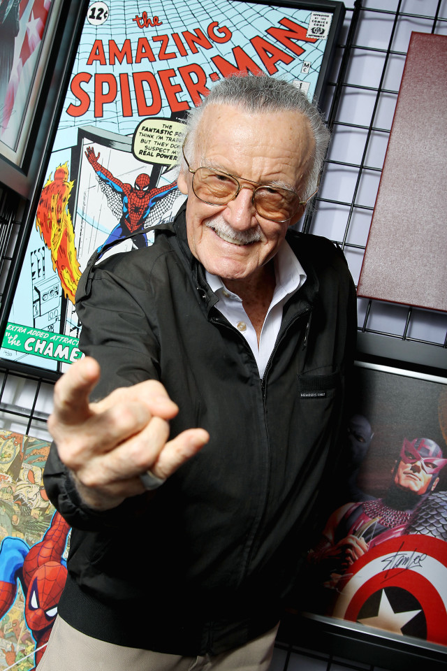 Man black jacket pointing spiderman free wallpaper - medium preview image