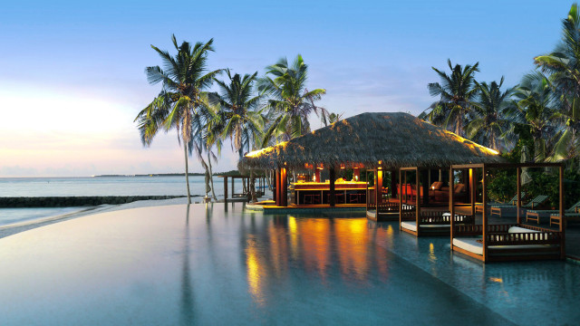 Resort pool bar thatched roof free wallpaper - medium preview image