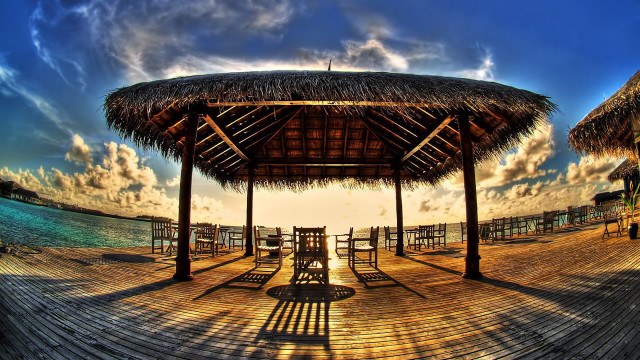 Wooden pier thatched roof bench free wallpaper - medium preview image