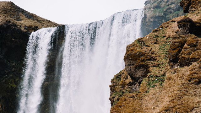 Waterfall man cliff bird nature free wallpaper - medium preview image