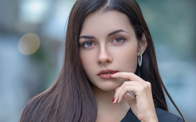 Woman longhair earrings finger chin free wallpaper - medium preview image