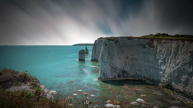 Cliff water boat mountain sky free wallpaper - medium preview image